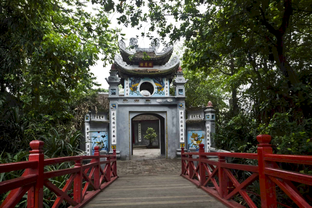 The temple is encircled by ancient trees, which lend a mystical and ancient ambiance